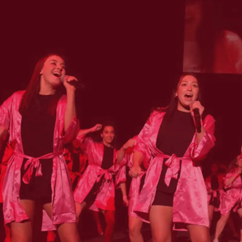 Greek sing students sing on stage