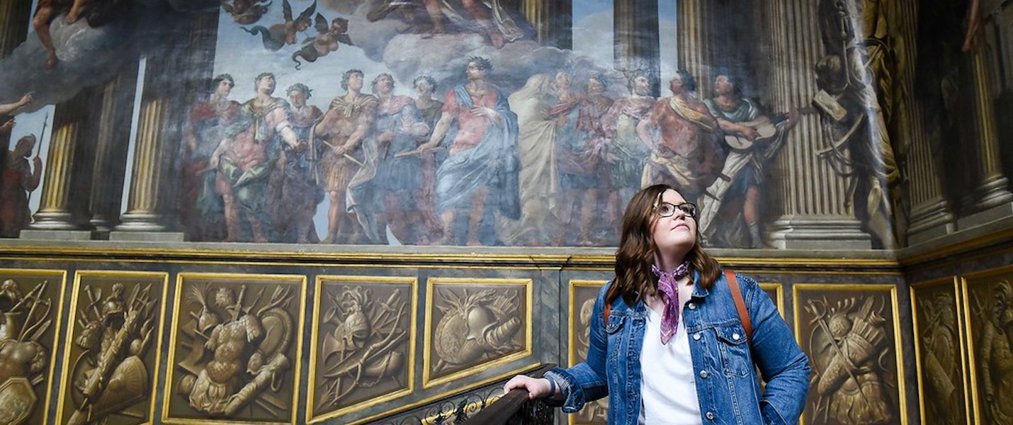 student on a study abroad trip in a museum