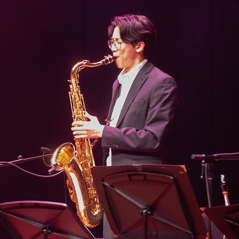 Sax student performs on stage
