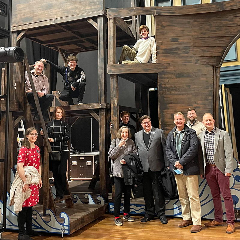 Theatre Production Design students posing with the set they constructed on stage