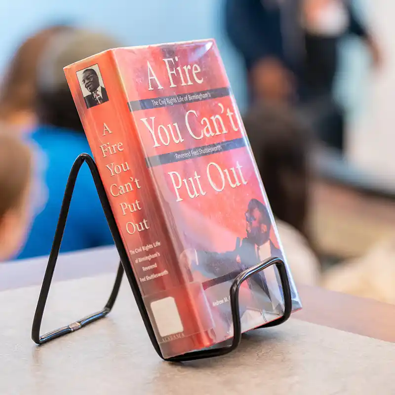 Book titled 'A Fire You Can’t Put Out' on display