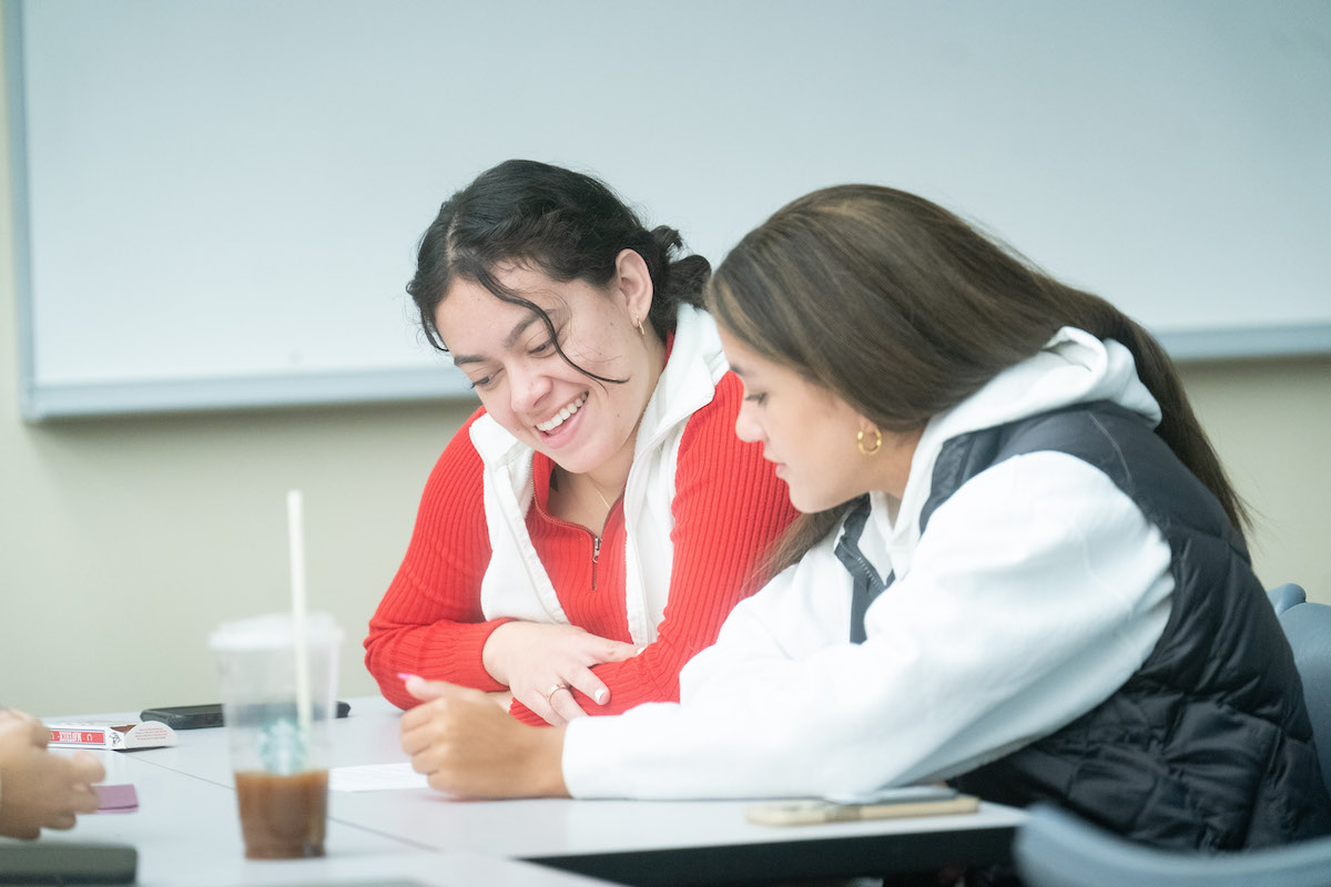 Two students study in a classroom at Belmont