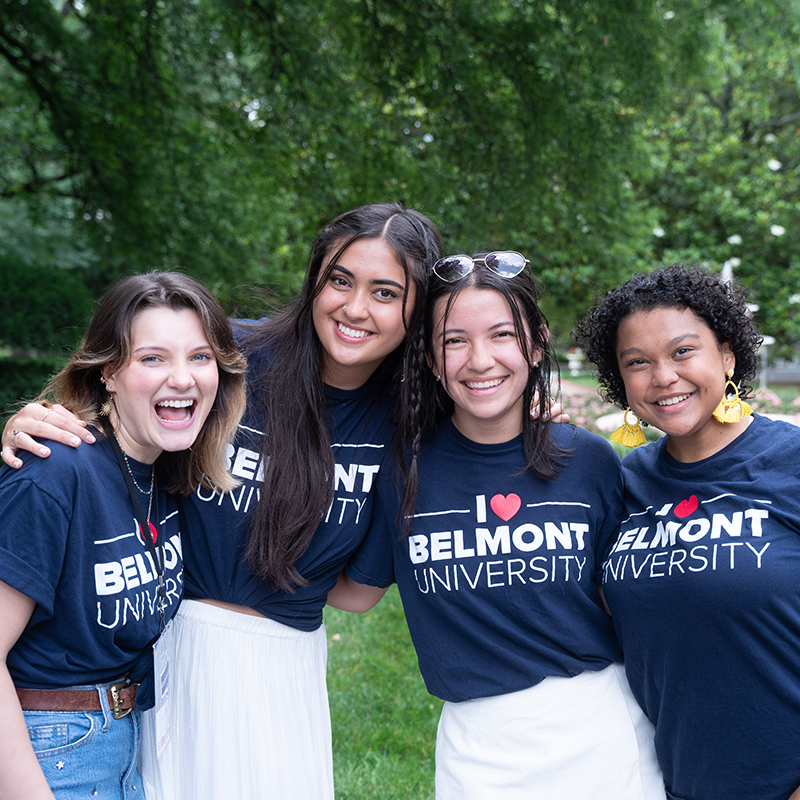 Belmont students posing with arms around each other during new student orientation