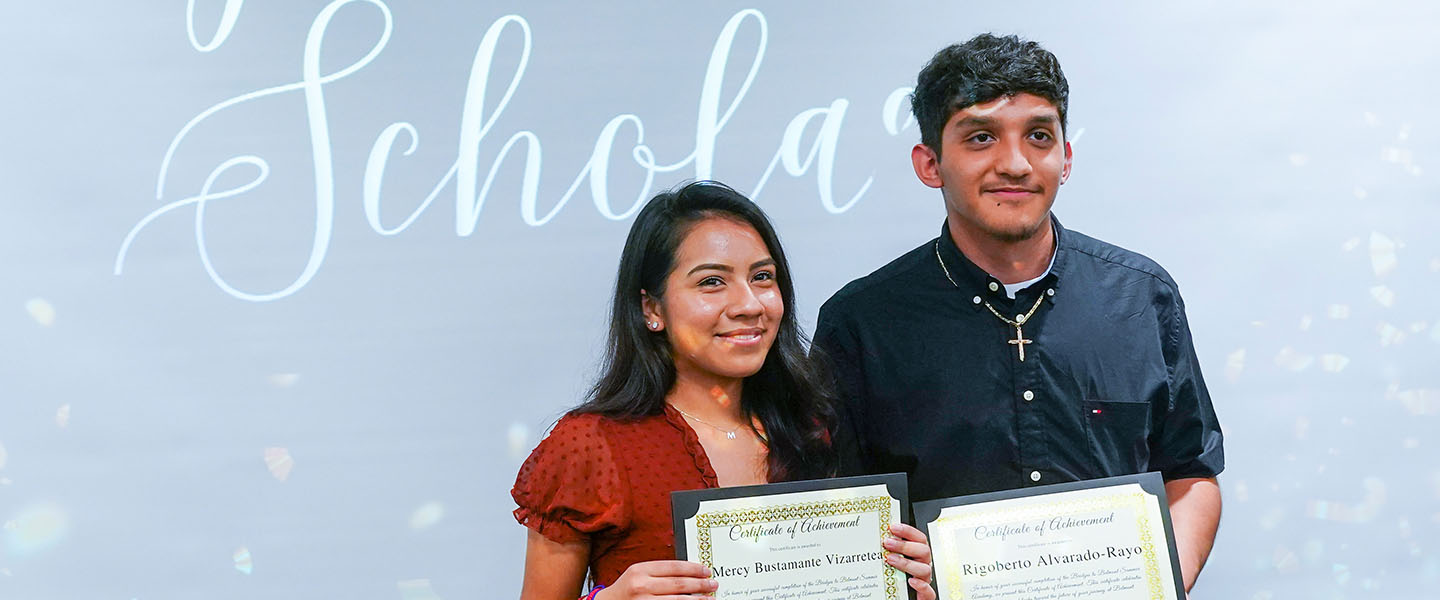 Two Bridges Scholars for a photo with their certificates