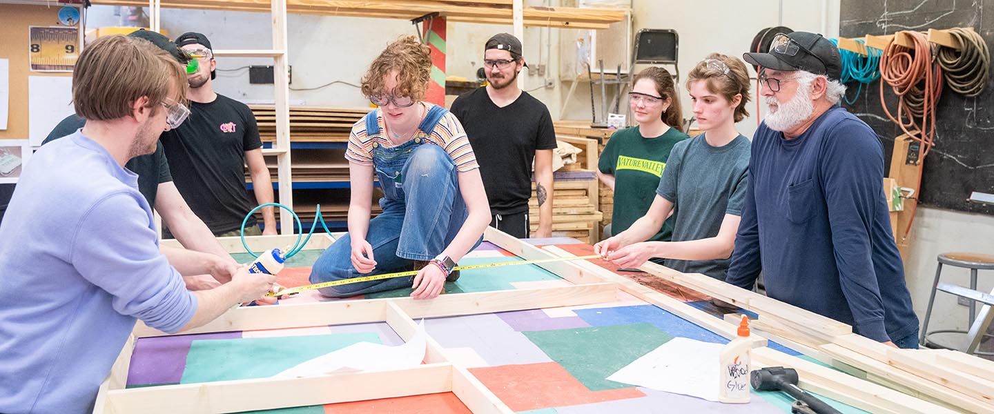 Students set build backstage in Troutt Theatre