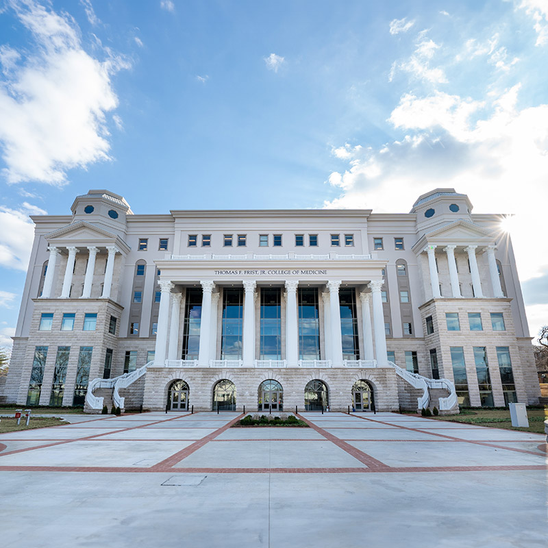 Thomas Frist Jr. College of Medicine building on a sunny day