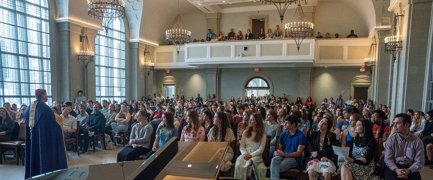 Students listen to Bishop Spalding during the Ash Wednesday Service in the Chapel