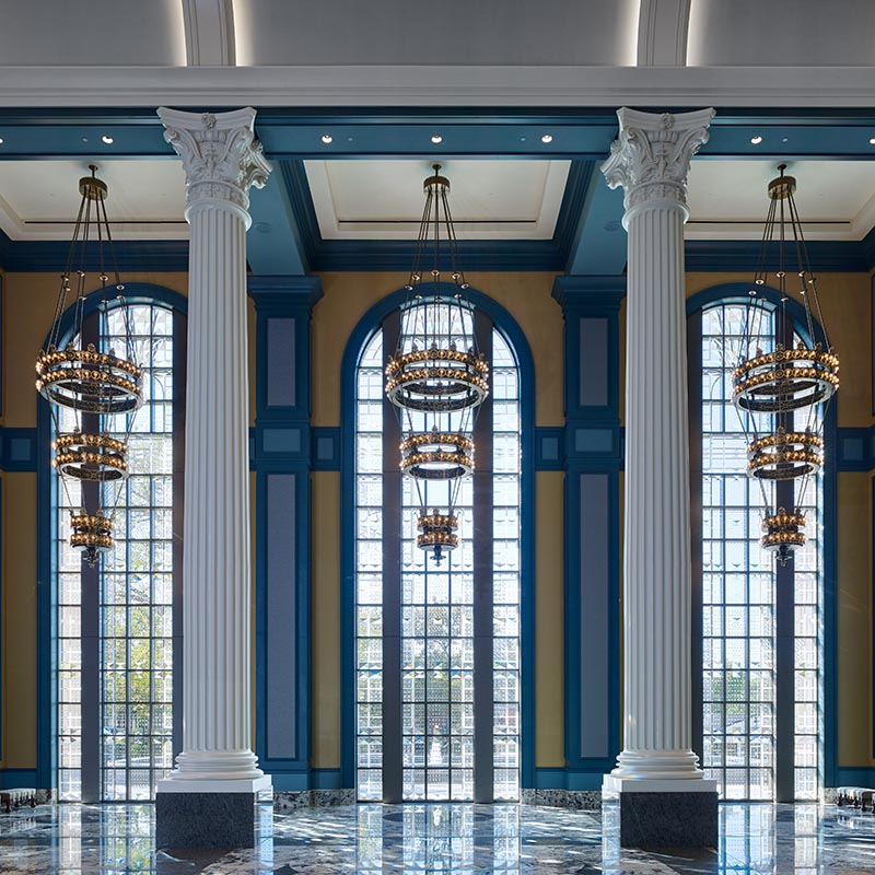 Inside of the Fisher Center for Performing Arts building with the sun shining through the windows