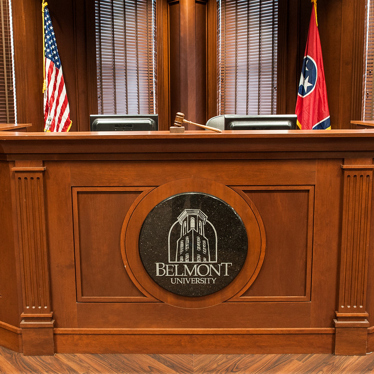 A close up of the Mock Trial Court Room's judges bench
