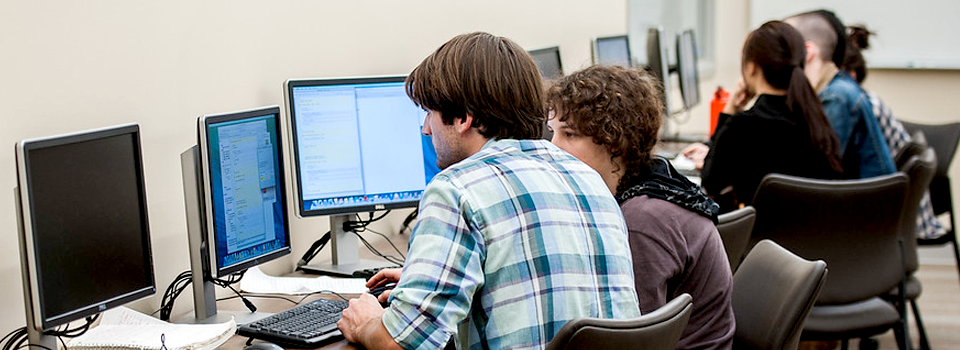 LITS Header Image = Student in Computer Lab
