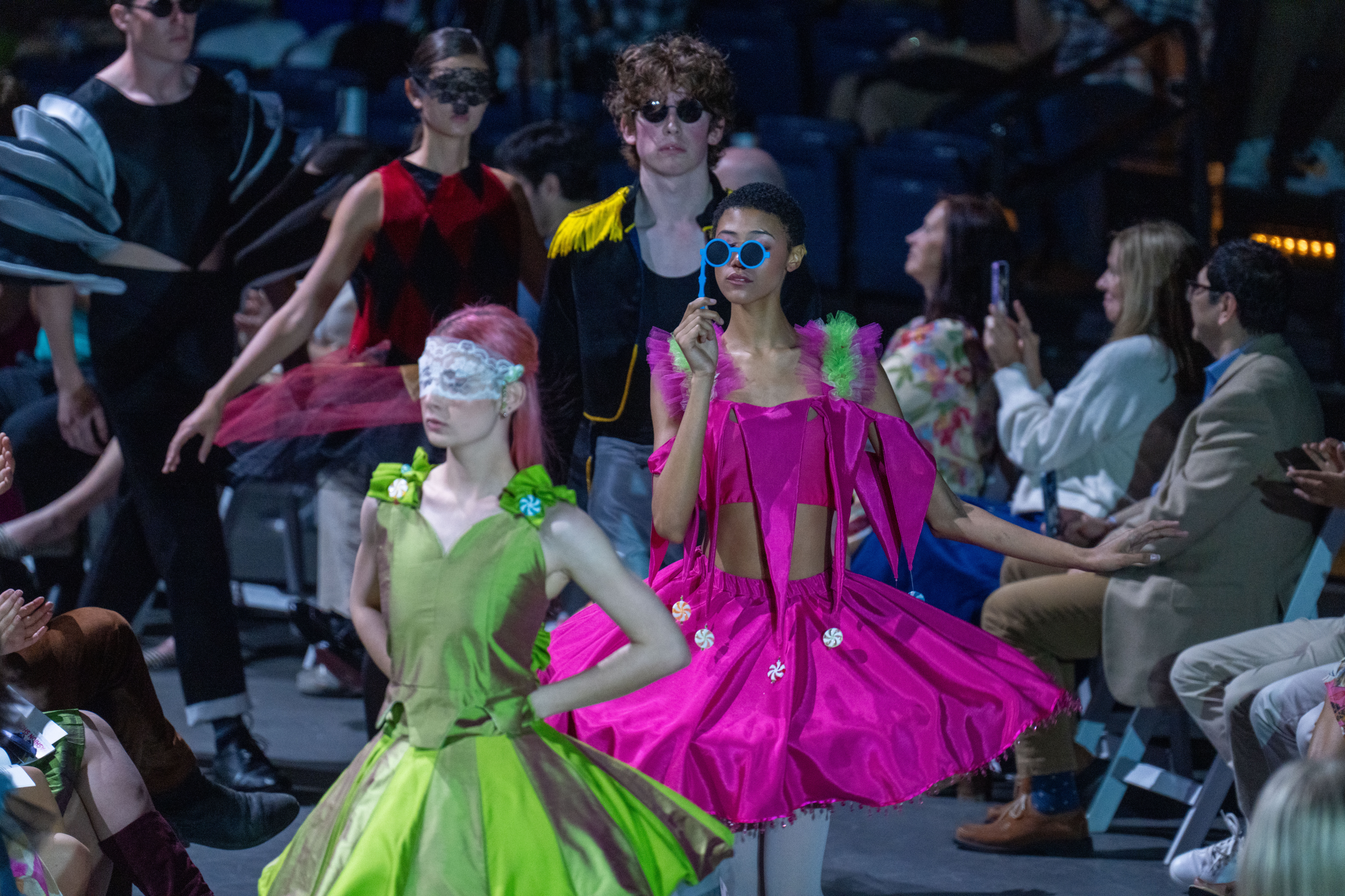 Fashion Design student walks in with their designs at annual fashion show