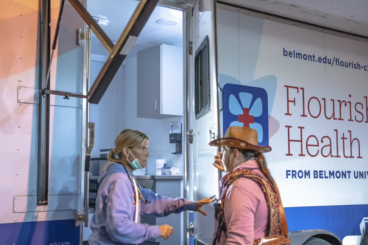Patient entering the Flourish Health Clinic