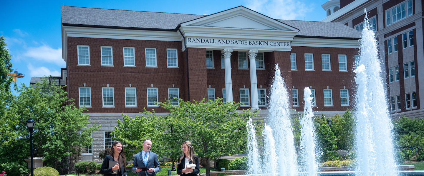 Law students outside of law building