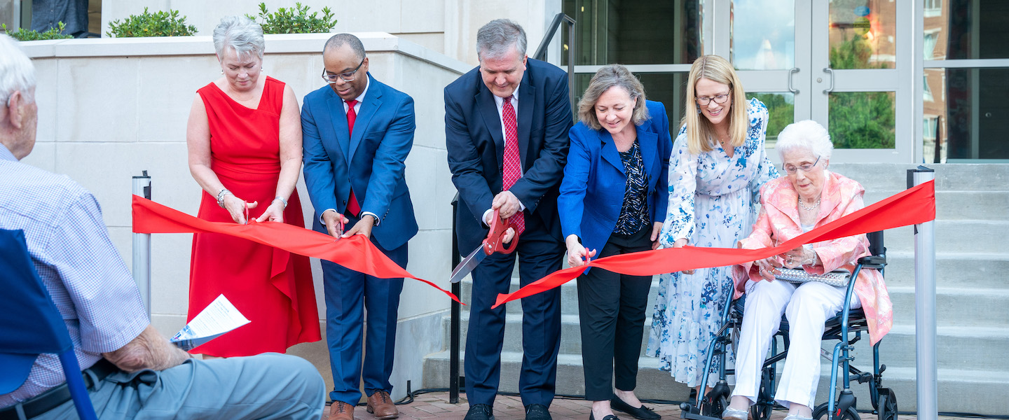 Dr. Greg Jones, the Rev. Susan Pendleton Jones, Barbara Massey Rogers and Dean Fisher Gardial cutting the ribbon..