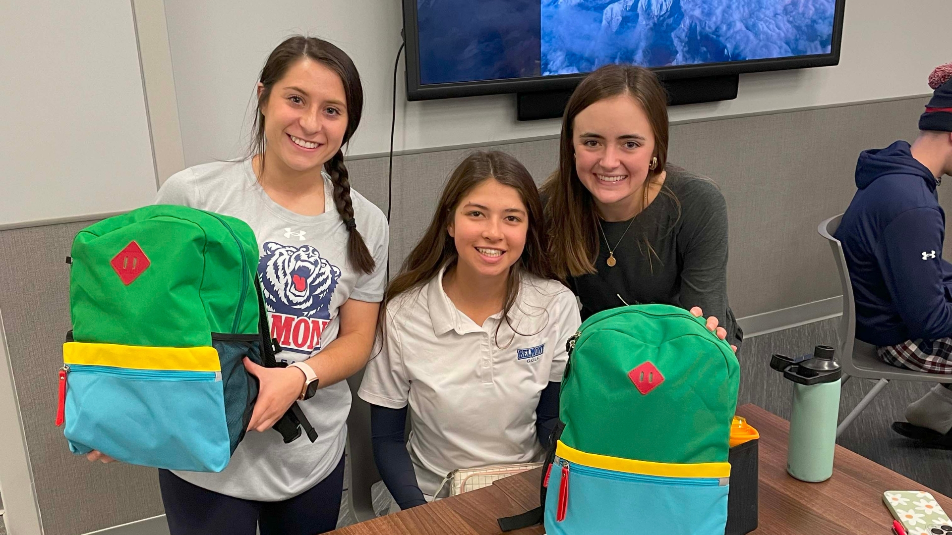 Belmont athletes pack backpacks during TAK PAK