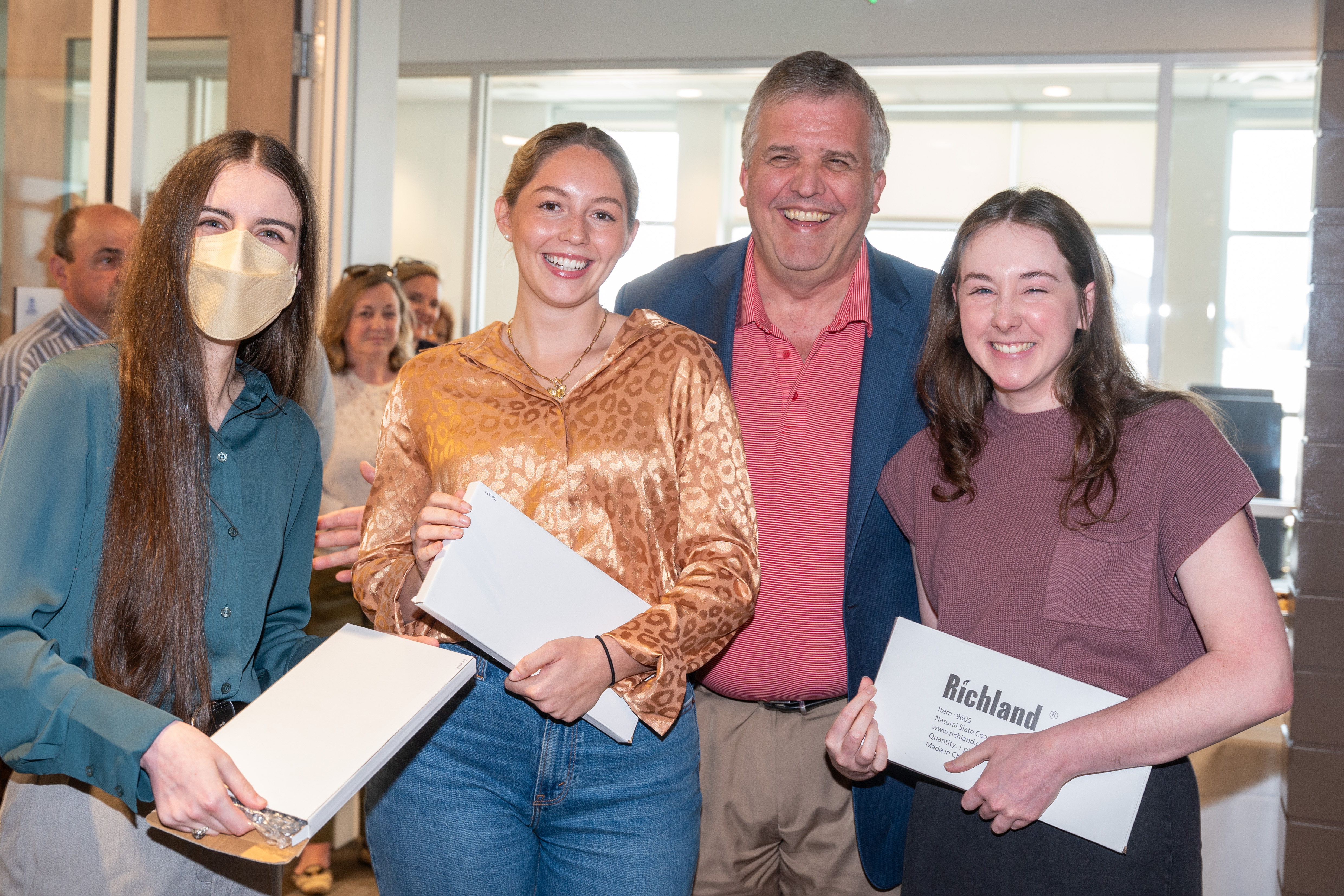 Design team pictured with University President Dr. Greg Jones