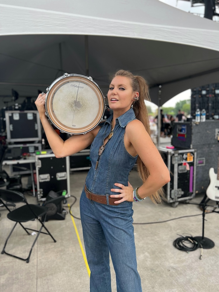 Kayleigh holding a drum