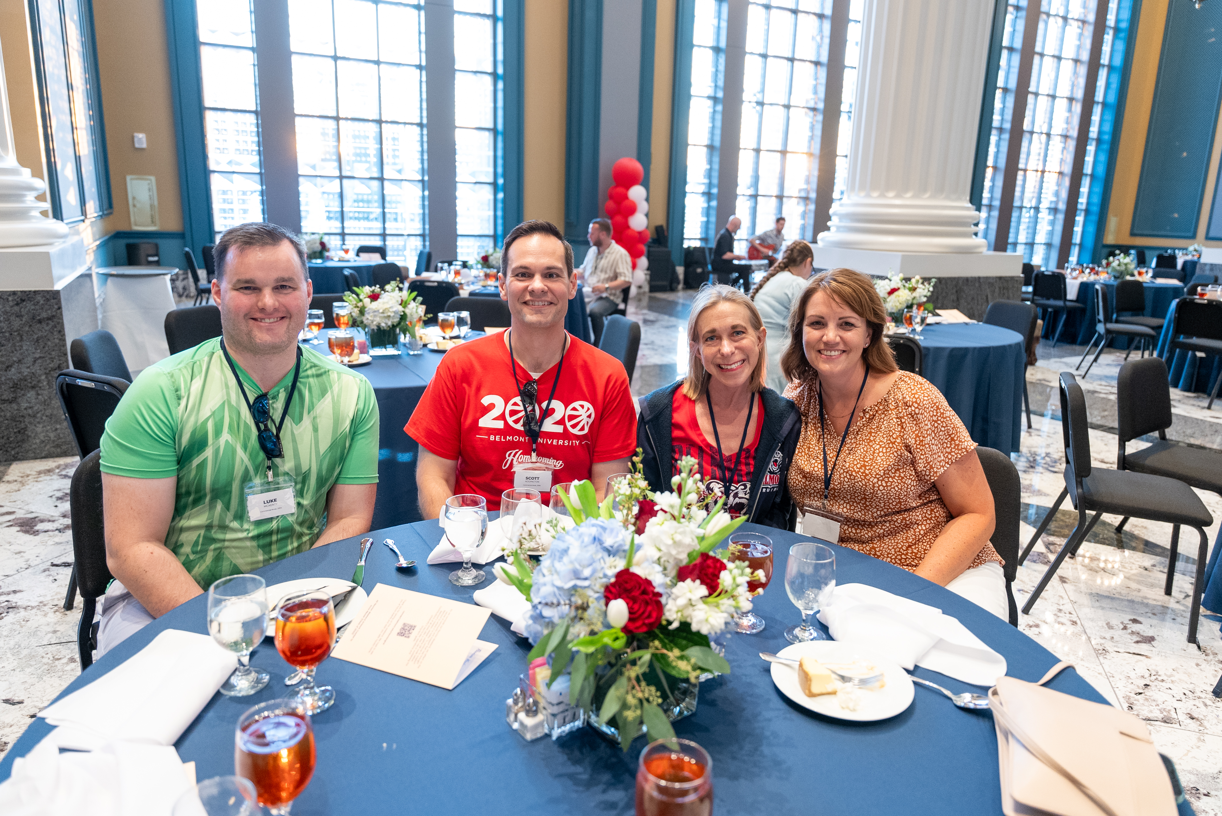 Group of people seated a banquet table