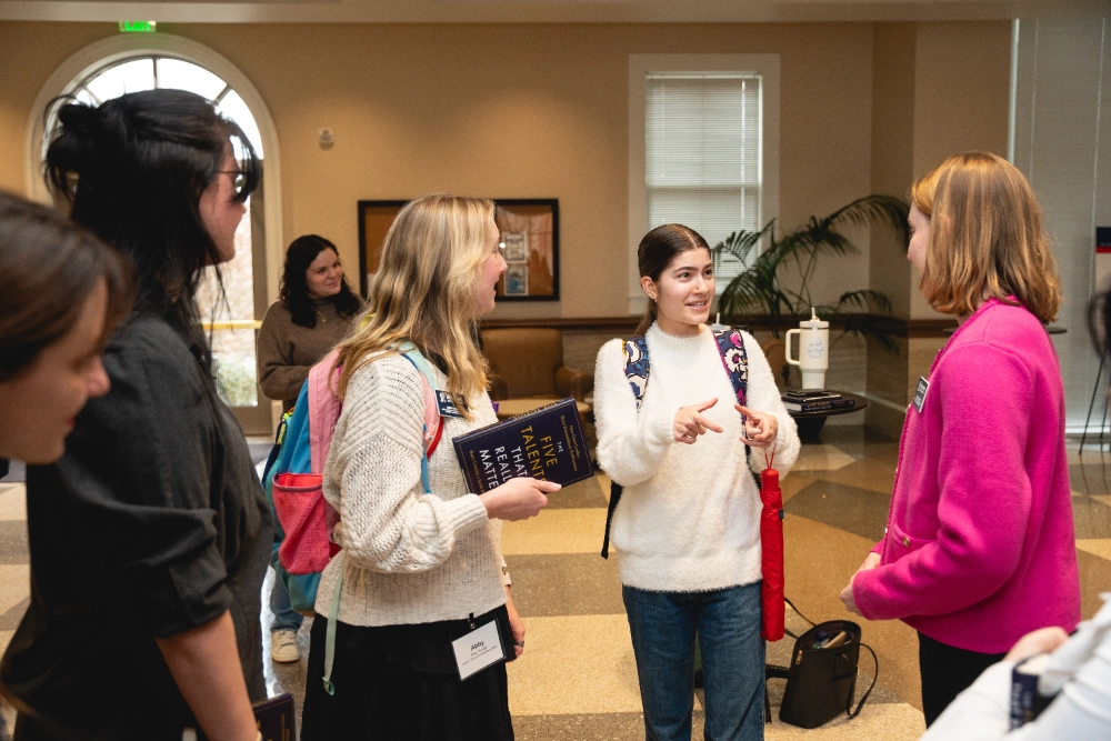 Social entrepreneurship students discussing at the Massey Power Skills Conference.