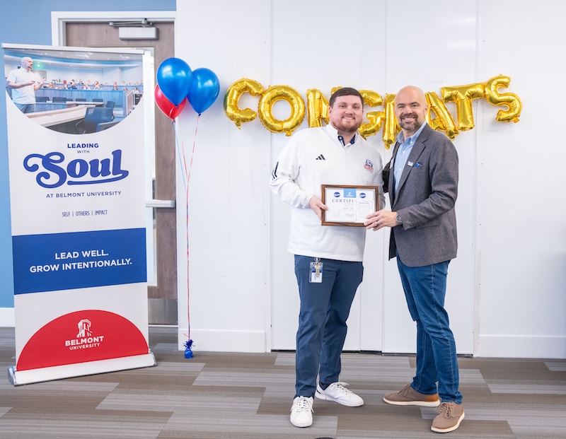 Nick Denton poses proudly with Jeremy Fyke holding an ELDP diploma