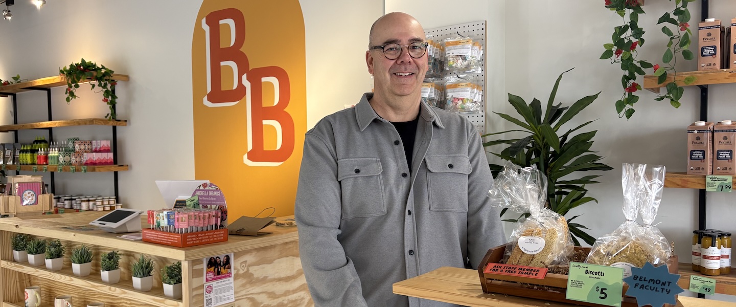 Matt Burhart with products in Bruin Bodega