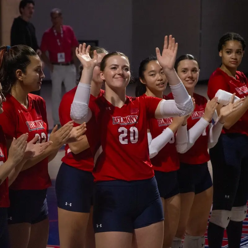 Laura celebrating with volleyball team