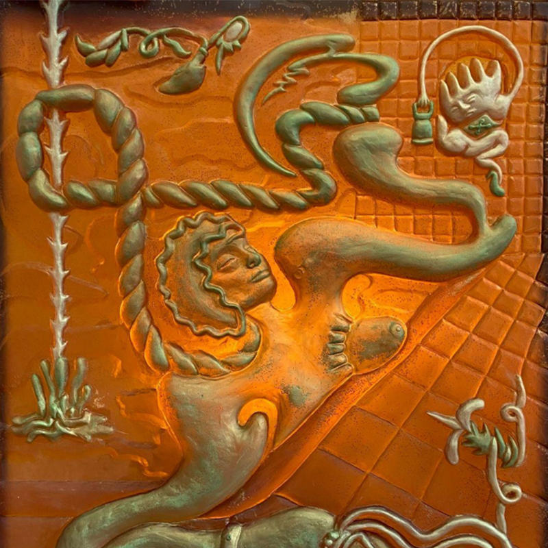 Detail of a glass relief sculpture with abstract motifs